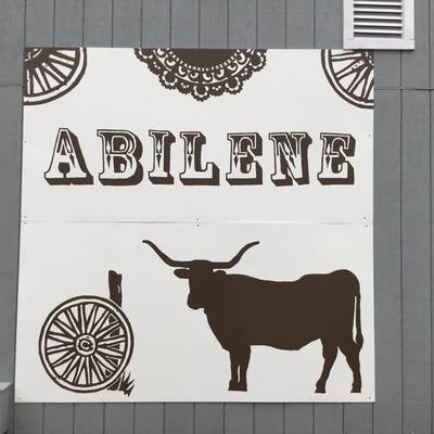 Partnering with other groups; this sign was made for Old Abilene Town.