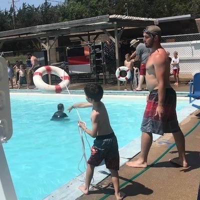 Youth are able to cool off at summer camp at the pool!