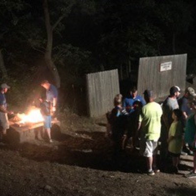A Scout is reverent. Each week summer campers shake the hands of Veterans and properly retire flags.
