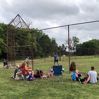 Playing softball in the old field.
